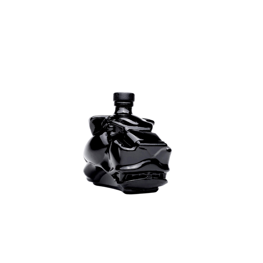 Mitre-Mezcal_Artesanal_Joven_schwarze_Jaguar-Kopf-Flasche